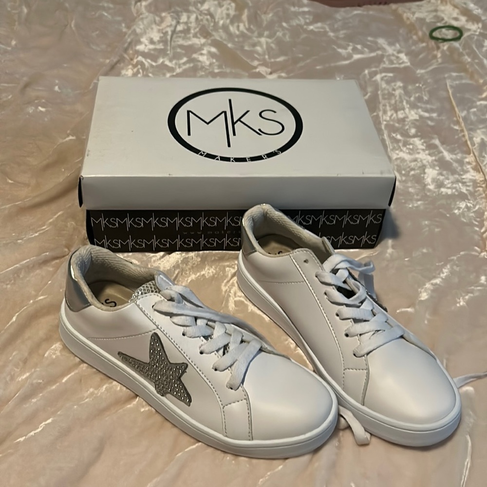 Brand new in box sneakers. Never worn.